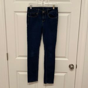 Dark wash skinny jeans. Size 5.